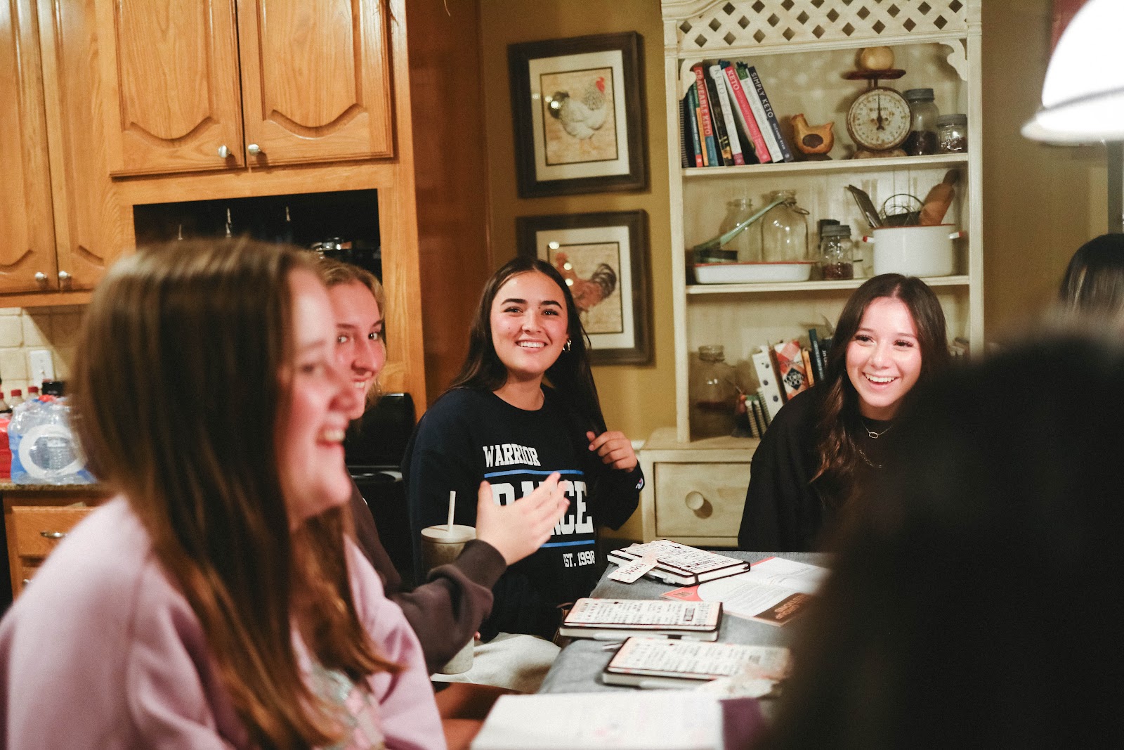 High school students studying the Bible together at a small group