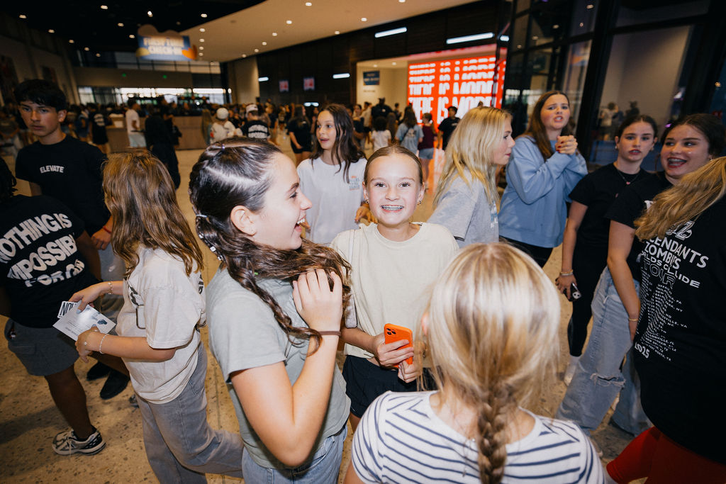 Students laughing together at Elevate check-in